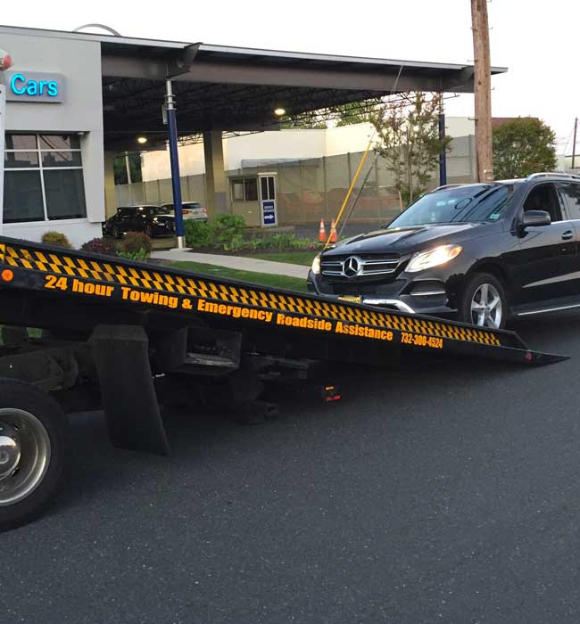First-Choice-Auto-Towing-Tow-Truck-Service-Toms-River-New-Jersey-White-Porsche-Loaded