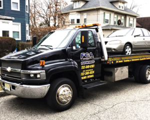 First-Choice-Towing-Service-Toms-River-New-Jersey-Black-Flatbed-Tow-Truck